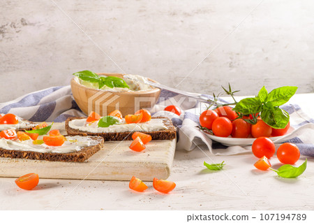 Rye bread bruschetta 107194789