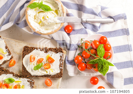 Rye bread bruschetta 107194805