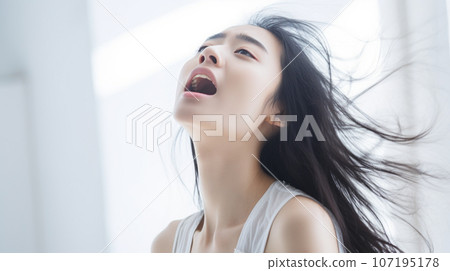 Profile of a woman singing to the sky Profile of a woman singing to the sky 107195178