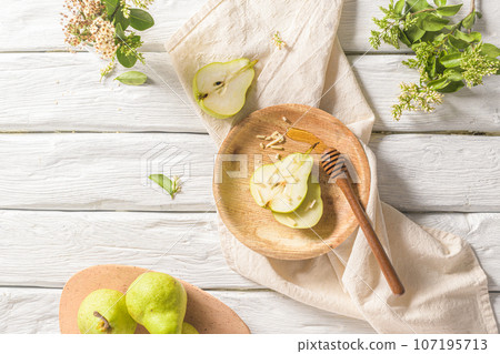 Tasty pears with honey and nuts Tasty pears with honey and nuts 107195713