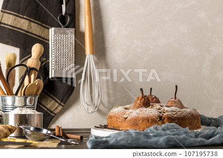 Delicious cake with pear and cinnamon Delicious cake with pear and cinnamon 107195738