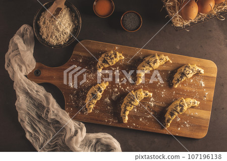 Raw croissant with ingredients 107196138