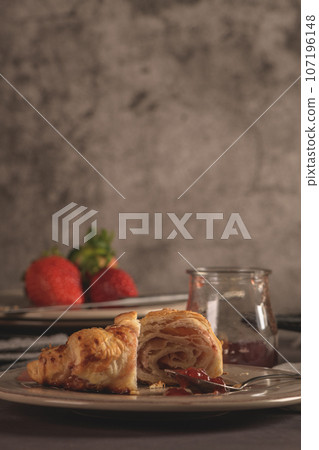 Baked croissants with strawberry jam Baked croissants with strawberry jam 107196148