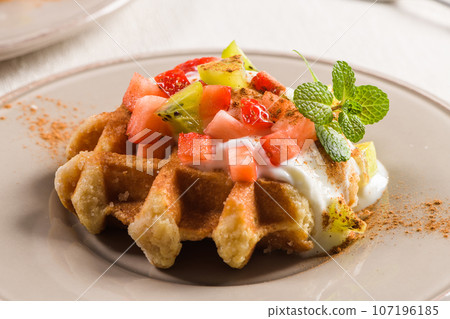 Fresh egg waffles dessert Fresh egg waffles dessert 107196185
