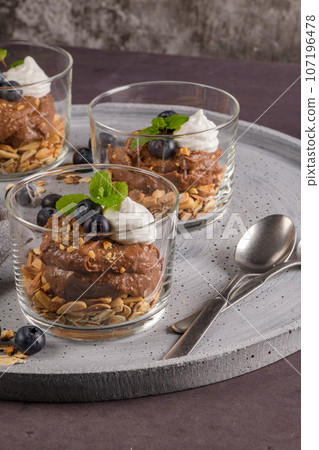 Glass cups of chocolate and chestnuts mousse Glass cups of chocolate and chestnuts mousse 107196478