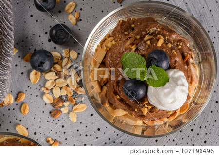 Glass cups of chocolate and chestnuts mousse Glass cups of chocolate and chestnuts mousse 107196496
