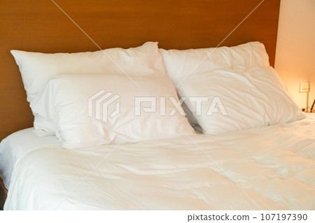 white pillow decoration on bed white pillow decoration on bed 107197390