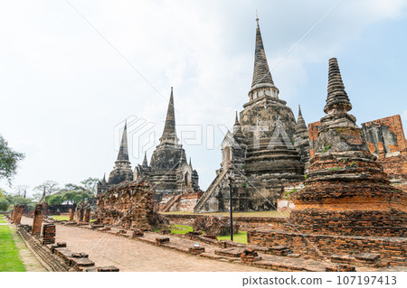 Wat Phra Sri Sanphet Temple in the precinct of Sukhothai Historical Park, a UNESCO World Heritage Site in Thailand Wat Phra Sri Sanphet Temple in the precinct of Sukhothai Historical Park, a UNESCO World Heritage Site in Thailand 107197413