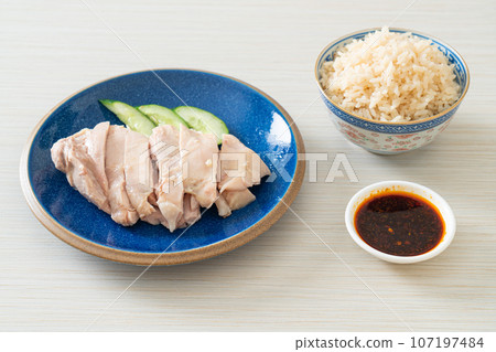 Hainanese chicken rice or rice steamed with chicken soup 107197484