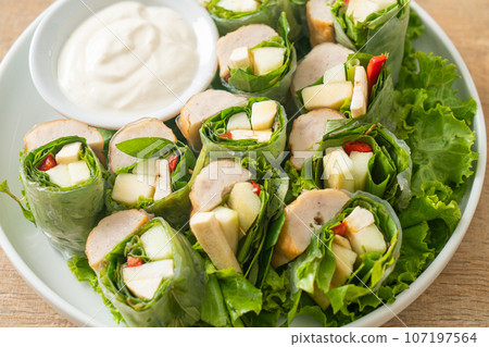 vegetables wrap or salad rolls with creamy salad sauce 107197564
