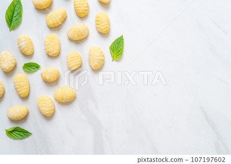 Traditional Italian gnocchi pasta - uncooked Traditional Italian gnocchi pasta - uncooked 107197602