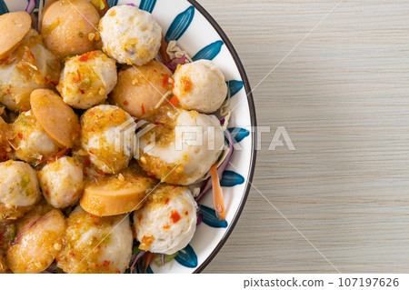 Meatball and fishball spicy salad Meatball and fishball spicy salad 107197626