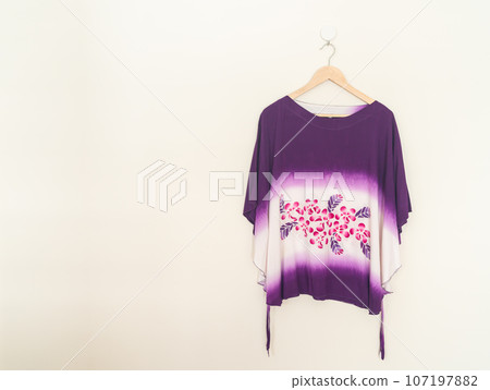 tie dye shirt hanging on wall tie dye shirt hanging on wall 107197882