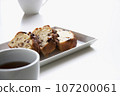 Pound cake and coffee, white tableware, white table 107200061