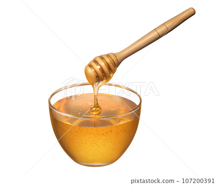 honey in a glass container 107200391