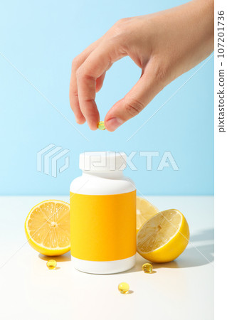 Bio-supplement vitamin C, in tablets on a light background. Bio-supplement vitamin C, in tablets on a light background. 107201736