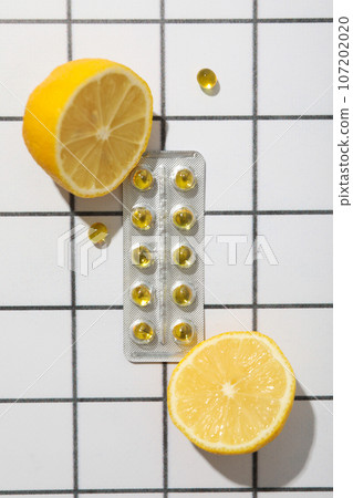 Vitamin C in a bottle in the form of tablets. Vitamin C in a bottle in the form of tablets. 107202020
