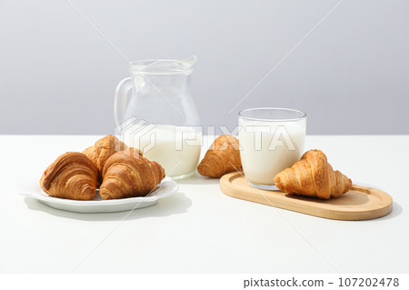 Breakfast tasty food concept - milk with bakery products Breakfast tasty food concept - milk with bakery products 107202478