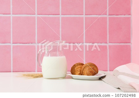 Breakfast tasty food concept - milk with bakery products 107202498