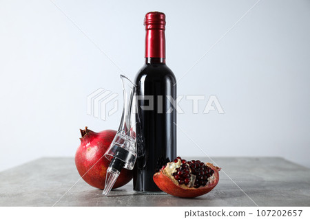 Pomegranate wine, gourmet alcohol drink, delicious beverage Pomegranate wine, gourmet alcohol drink, delicious beverage 107202657