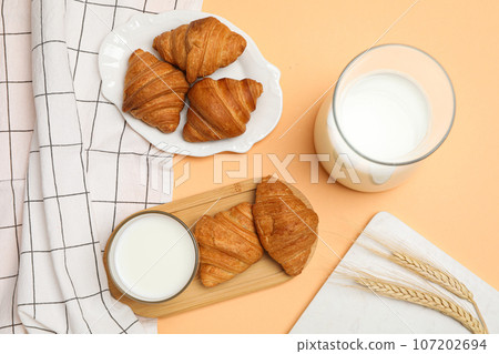Breakfast tasty food concept - milk with bakery products Breakfast tasty food concept - milk with bakery products 107202694