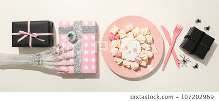 Skull cookies with marshmallows and Halloween gifts Skull cookies with marshmallows and Halloween gifts 107202969