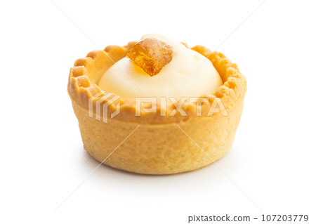 Sweet tarlets. Tasty mini tarts. Mini pie with cream isolated on white background. Sweet tarlets. Tasty mini tarts. Mini pie with cream isolated on white background. 107203779