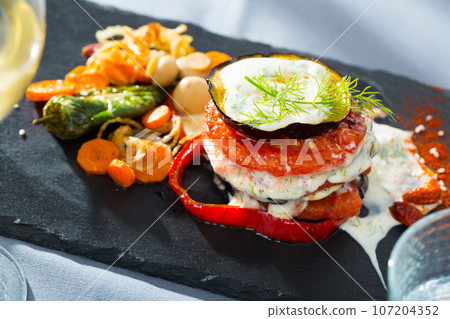 Fried eggplant and tomato pyramid Fried eggplant and tomato pyramid 107204352