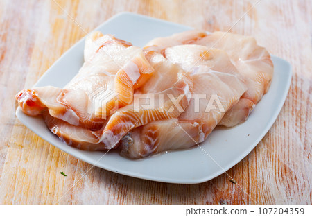 Fresh raw blue shark steaks 107204359