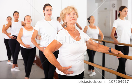 Group of women doing ballet dance moves Group of women doing ballet dance moves 107204917