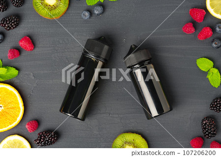 Vape smoking liquid with berry flavor close up Vape smoking liquid with berry flavor close up 107206200