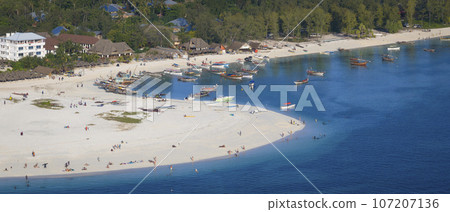 Beautiful aerial view of wooden fisherman boats at Kendwa village Beautiful aerial view of wooden fisherman boats at Kendwa village 107207136
