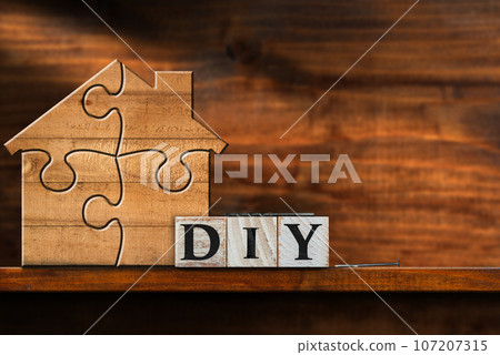 Wooden House Made of Puzzle Pieces and Text Diy Wooden House Made of Puzzle Pieces and Text Diy 107207315