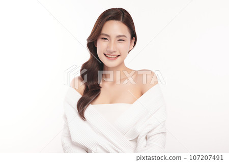 Beautiful young asian woman with clean fresh skin on white background, Face care, Facial treatment, Cosmetology, beauty and spa, Asian women portrait. Beautiful young asian woman with clean fresh skin on white background, Face care, Facial treatment, Cosmetology, beauty and spa, Asian women portrait. 107207491