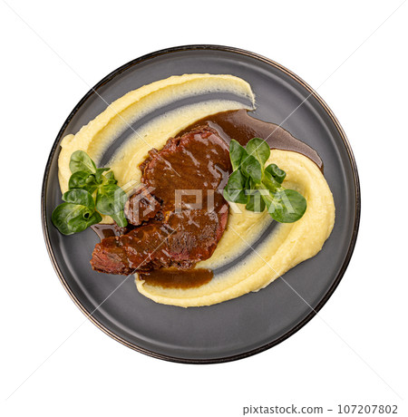Smoked barbecue beef topped with bbq sauce Smoked barbecue beef topped with bbq sauce 107207802