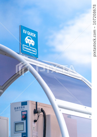 EV charging spot electric car quick charger EV QUICK CHARGER blue sky EV charging spot electric car quick charger EV QUICK CHARGER blue sky 107208678