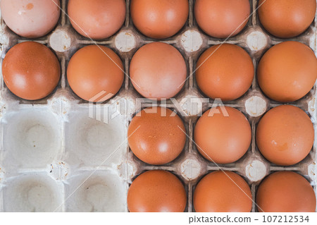 Top view chicken egg packaging, fresh food from farmers market, recycled packaging 107212534
