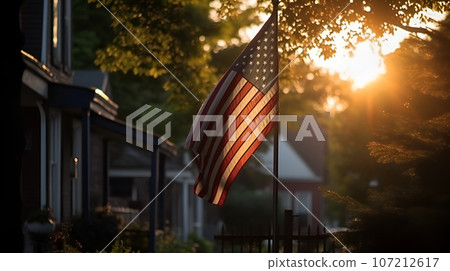 USA flag in the rays of the warm setting sun, set on the lawn next to the house, independence day on July 4, AI generated, idea for a background or postcard 107212617