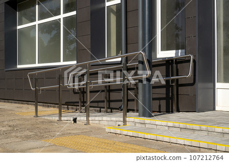 Ramp for wheelchairs on a newly renovated building Ramp for wheelchairs on a newly renovated building 107212764