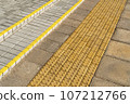 Yellow blocks of tactile paving for blind handicap 107212766