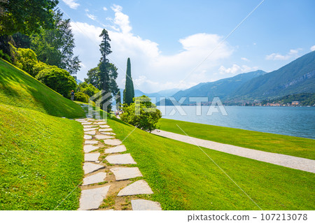 Greenery of botanical gardens at Villa Melzi in Bellagio. Como Lake, Italy Greenery of botanical gardens at Villa Melzi in Bellagio. Como Lake, Italy 107213078