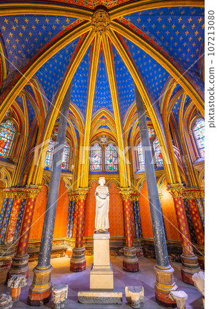 Lower chapel of Sainte-Chapelle with statue of Louis IX. Palais de la Cite, Paris, France 107213080