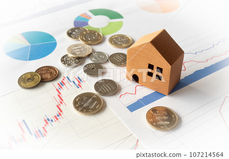 Candlesticks and coins graphs finance economy asset management real estate investment inheritance gift 107214564