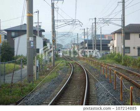 At the railroad crossing At the railroad crossing 107214885