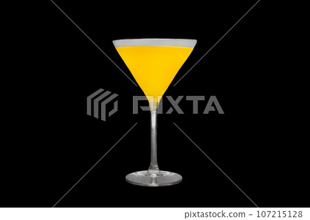 A martini glass with a yellow alcoholic beverage on an black background A martini glass with a yellow alcoholic beverage on an black background 107215128