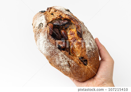 Pain de campagne with figs on white background 107215410