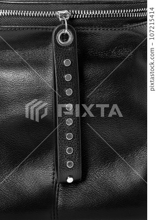Close up of black leather bag zipper Close up of black leather bag zipper 107215414