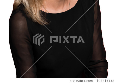 Close-up of girl in black translucent dress on her arms, fashion and style of clothing on white background, isolated 107215438