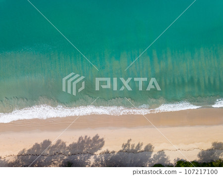 Sea surface aerial view,Bird eye view photo of crashing waves on sandy shore,Beach sea water surface texture,sea sand background,Beautiful nature seascape,Amazing top view beach background Sea surface aerial view,Bird eye view photo of crashing waves on sandy shore,Beach sea water surface texture,sea sand background,Beautiful nature seascape,Amazing top view beach background 107217100