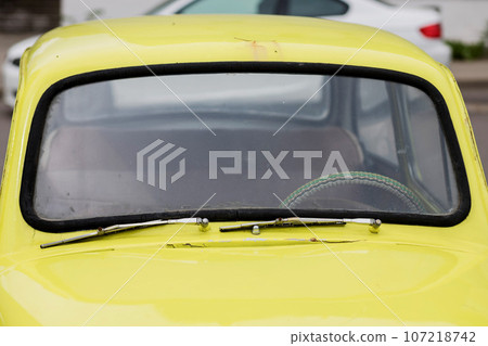 yellow retro classic car yellow retro classic car 107218742